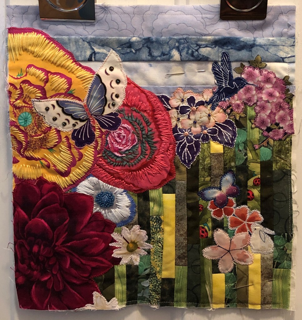 Art quilt celebrating pollinators.