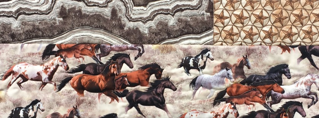 Outline quilting on a wild horses quilt